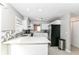 Modern kitchen with white cabinets, stainless steel appliances, and stylish countertops at 11612 E 75Th St, Indianapolis, IN 46236