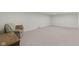 Finished basement featuring neutral carpeting and comfortable seating at 11807 Rolling Springs Dr, Carmel, IN 46033