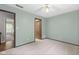 Bedroom with neutral carpet, and access to another room at 11807 Rolling Springs Dr, Carmel, IN 46033