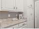 Kitchen features custom white cabinets and granite countertops at 11807 Rolling Springs Dr, Carmel, IN 46033