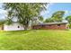 Large backyard with detached garage and brick home at 12029 Meadow Ln, Indianapolis, IN 46236