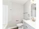 Bathroom featuring a toilet, vanity and shower/tub combo with modern fixtures at 12029 Meadow Ln, Indianapolis, IN 46236