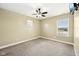 Bedroom showcasing neutral walls, carpet, a ceiling fan and a window that provides plenty of natural light at 13163 N Departure W Blvd, Camby, IN 46113