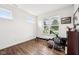 Home gym features a rowing machine, free weights, and ample natural light at 13163 N Departure W Blvd, Camby, IN 46113