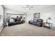 Spacious living room with two sofas, open to the modern kitchen for seamless entertaining at 13163 N Departure W Blvd, Camby, IN 46113
