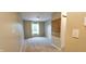 Bedroom with neutral paint, carpet, window with blinds, and a feature wall at 13225 Deception Pass # 1200, Fishers, IN 46038