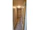 Walk-in closet with carpet, shelving, and a unique vintage door at 13225 Deception Pass # 1200, Fishers, IN 46038