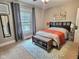 Bedroom with window and patterned rug at 1336 Lafayette Ave, Columbus, IN 47201