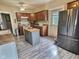 Well-equipped kitchen with stainless steel appliances, an island, and ample counter space at 1336 Lafayette Ave, Columbus, IN 47201
