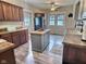Bright kitchen with an island and stainless steel refrigerator at 1336 Lafayette Ave, Columbus, IN 47201