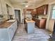 Traditional kitchen featuring two-tone cabinetry and an island at 1336 Lafayette Ave, Columbus, IN 47201