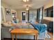 Spacious living room featuring hardwood floors, comfortable seating, and natural light at 1336 Lafayette Ave, Columbus, IN 47201