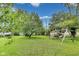 The backyard is an ample green space that features a large playset at 1617 S Whittier Pl, Indianapolis, IN 46203