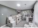 bedroom with bunk bed, desk, and plush toys at 1617 S Whittier Pl, Indianapolis, IN 46203