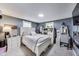 Bright bedroom featuring a white bed, drawers and gray walls at 1617 S Whittier Pl, Indianapolis, IN 46203