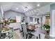 Elegant dining room with stylish seating, modern lighting, and an open layout at 1617 S Whittier Pl, Indianapolis, IN 46203