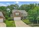 Inviting two-story home with brick and siding exterior, manicured lawn, and attached two-car garage at 16732 Maraschino Dr, Noblesville, IN 46062