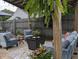 Inviting outdoor patio with stylish seating, plants, and a decorative rug at 1728 Newton St, Columbus, IN 47201