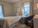 Bright bedroom featuring natural light and a cozy layout at 1728 Newton St, Columbus, IN 47201
