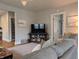 Comfortable living room with a cozy seating area and modern entertainment setup on a media console at 1728 Newton St, Columbus, IN 47201