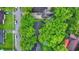 Aerial view of property showing lush landscaping and neighborhood streets at 1926 Fairmont Ct, Indianapolis, IN 46229