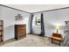 Bedroom featuring an end table, a window, carpeting, and neutral paint at 1926 Fairmont Ct, Indianapolis, IN 46229