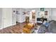 Cozy living room with hardwood floors, grey sofa, stylish decor, and an open floor plan at 1926 Fairmont Ct, Indianapolis, IN 46229