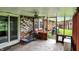 Covered patio with brick accents offers outdoor lounging or dining at 1926 Fairmont Ct, Indianapolis, IN 46229
