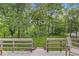 Inviting backyard with stairs leading to lush green space and a tire swing, perfect for outdoor enjoyment at 20322 Wagon Trail Dr, Noblesville, IN 46060