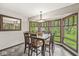 Dining room with large windows offering scenic views and natural light at 20322 Wagon Trail Dr, Noblesville, IN 46060