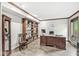 Spacious home office with custom built-ins and a large desk, perfect for productivity and organization at 20322 Wagon Trail Dr, Noblesville, IN 46060