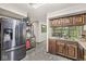 Kitchen with stainless steel refrigerator and natural light, creating functional space at 20322 Wagon Trail Dr, Noblesville, IN 46060