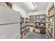 Well-organized pantry with ample shelving and storage space at 20322 Wagon Trail Dr, Noblesville, IN 46060
