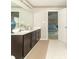 Stylish bathroom featuring double vanities, a neutral color palette, and modern lighting at 2260 Santa Fe Dr, Greenfield, IN 46140