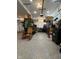 Well-lit garage with epoxy floors, storage solutions and room for vehicles or hobbies at 2260 Santa Fe Dr, Greenfield, IN 46140