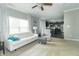 Spacious living room with a comfortable white sofa, stylish decor, and an open view into the kitchen at 2260 Santa Fe Dr, Greenfield, IN 46140