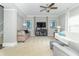 Inviting living room features plush seating, soft lighting, and stylish gray walls at 2260 Santa Fe Dr, Greenfield, IN 46140