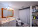 The full bathroom features a shower and storage at 2358 Hovey St, Indianapolis, IN 46218