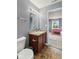 Bathroom with a view to the bedroom, featuring a modern sink and fixtures at 2509 Cedarmill Dr, Franklin, IN 46131
