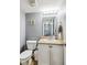 Half bathroom featuring a toilet, vanity, and neutral decor at 2509 Cedarmill Dr, Franklin, IN 46131