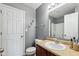 Functional bathroom with a single sink vanity, toilet, and shower at 2509 Cedarmill Dr, Franklin, IN 46131
