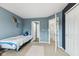 Comfortable bedroom with a bed and ample natural light from the adjacent rooms at 2509 Cedarmill Dr, Franklin, IN 46131