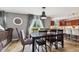Bright dining room featuring tile flooring, a large table, and backyard views at 2509 Cedarmill Dr, Franklin, IN 46131
