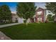 Attractive two-story house with a brick facade, shutters, a large lawn, and mature landscaping at 2509 Cedarmill Dr, Franklin, IN 46131