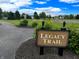 Legacy Trail with lush green grass, a basketball court, and beautiful blue sky with fluffy white clouds at 2509 Cedarmill Dr, Franklin, IN 46131