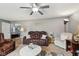 Comfortable living room with plush seating, modern decor, and ample lighting at 2509 Cedarmill Dr, Franklin, IN 46131