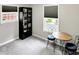 Bedroom showcasing a table and chairs, a bookcase, and lots of natural light at 2612 E Northgate St, Indianapolis, IN 46220