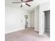 Neutral bedroom featuring neutral carpeting, overhead fan and fixture, and natural lighting at 2823 Boulevard Pl, Indianapolis, IN 46208