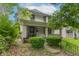 Charming two-story home featuring a cozy front porch and well-maintained landscaping in a residential neighborhood at 2823 Boulevard Pl, Indianapolis, IN 46208