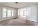 Spacious and inviting living room with fresh white trim and lots of natural lighting at 2823 Boulevard Pl, Indianapolis, IN 46208